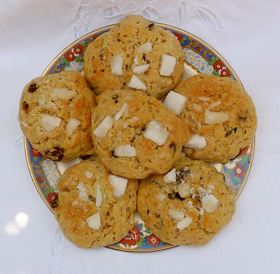 A plate of Paris buns topped with sugar nibs