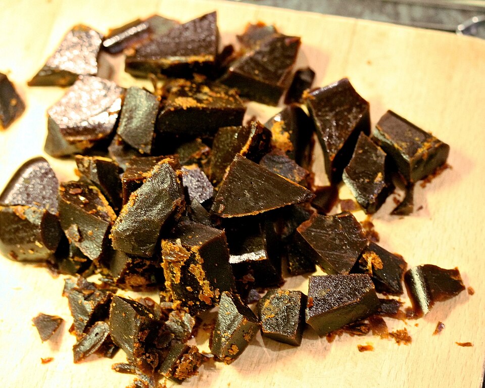 Broken pieces of dark treacle toffee