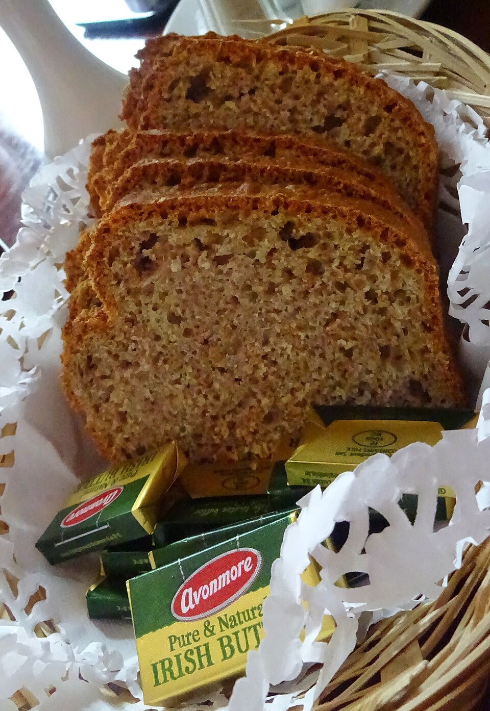 Slices of brown wheaten bread with Irish butter