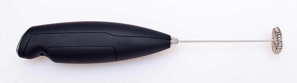 A battery-powered milk frother wand