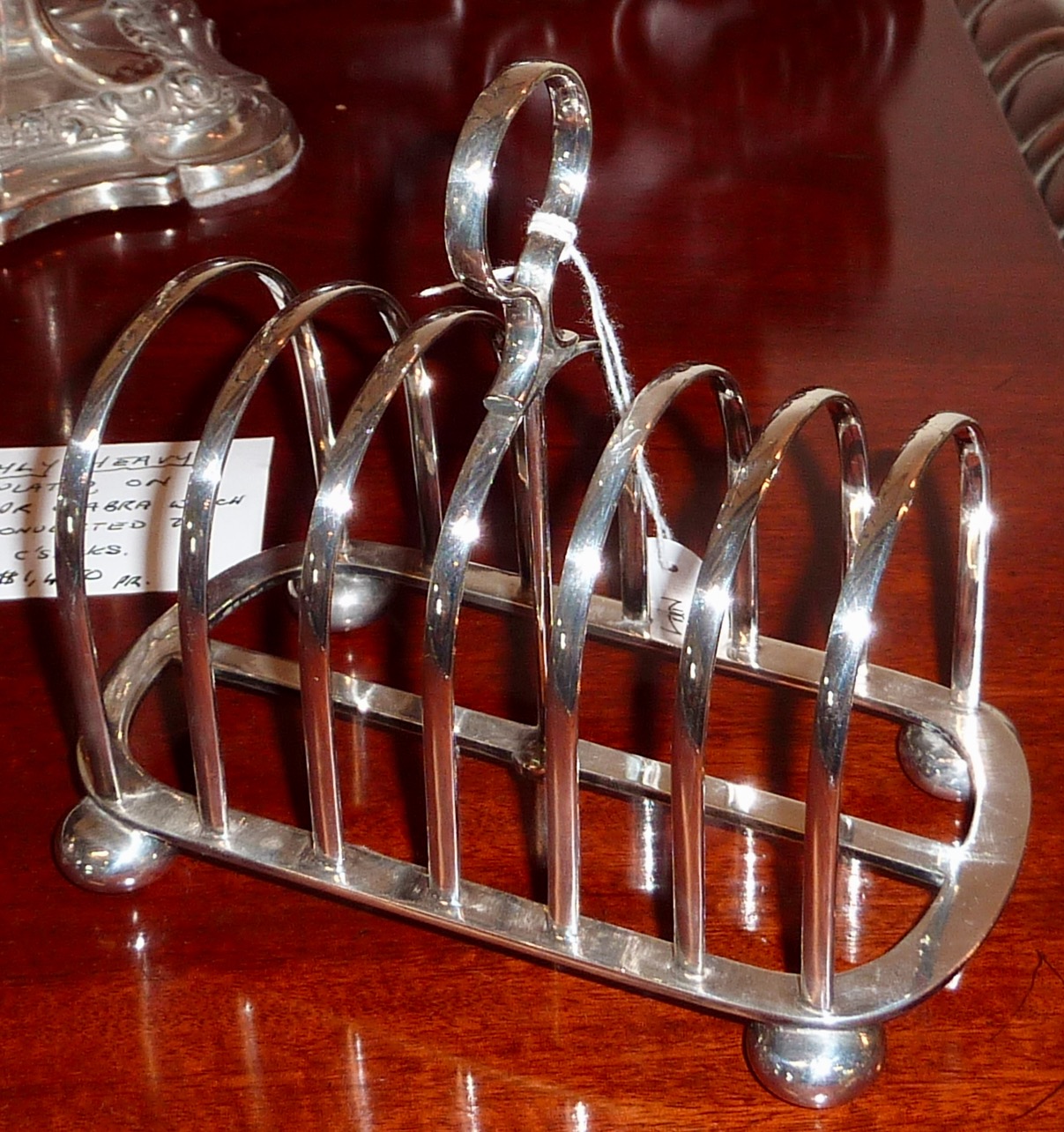 A silver-plated Walker & Hall toast rack