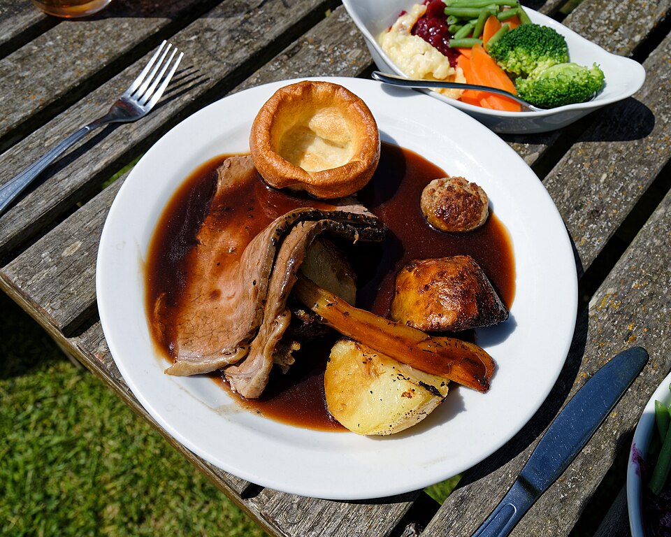 Roast beef with Yorkshire pudding, potatoes and gravy